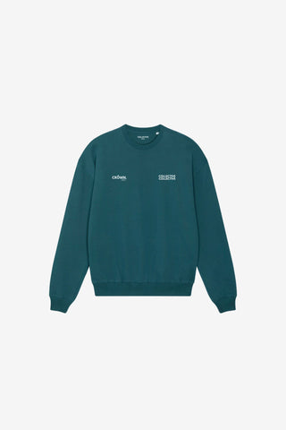 Teal sweatshirt with white text on a light gray background